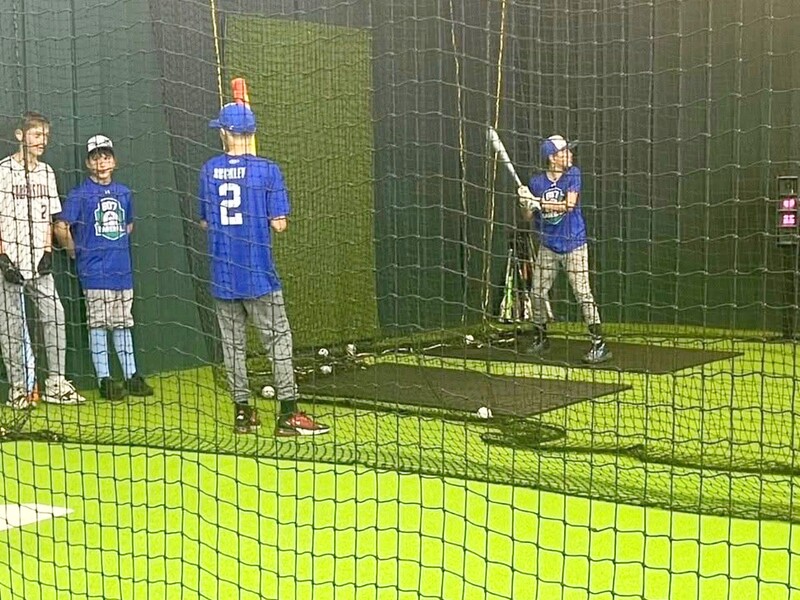 Youth players training at Chenango SportsZone batting cages