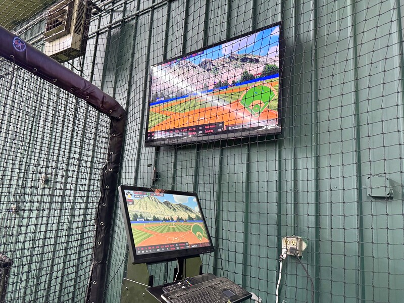 HitTrax dual-screen simulator system at Chenango SportsZone
